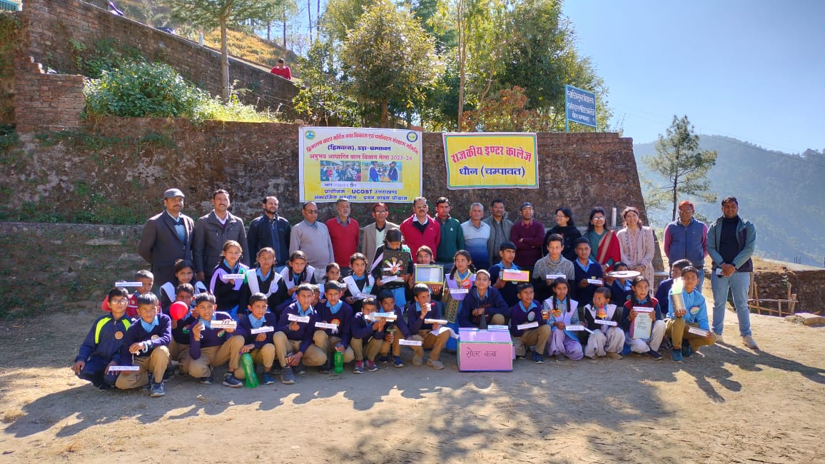 Students and teachers gathered for a group photograph at the science fair at GIC Dhaun.